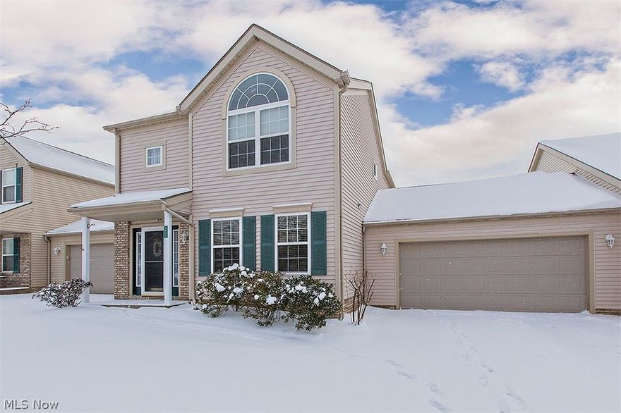 Just move right in! This inviting 3 bedroom town-home has a brand new wood-look laminate floor in the foyer, Great Room, Dining Room, Kitchen and Laundry Room plus new light fixtures and a fresh coat of paint. The light and airy floor plan features a sunny kitchen and dining area with a slider to the deck and a vaulted Great Room. A first floor Bedroom/ Den with adjacent full bath is ideal for guests or as an alternate Master Bedroom. The kitchen features cherry cabinets, a breakfast bar and all appliances. The washer and dryer also remain. The elegant, vaulted Master Bedroom has large double closets. The spacious two-car garage has an access door to the backyard. Enjoy the Huntford Farms amenities - pool, clubhouse and party room! This is an outstanding location with quick Cleveland or Akron access via I-271/480 and Rt 8 and the Turnpike. The Cuyahoga Valley National Park, Macedonia Recreation Center, Longwood Park and Golf are only minutes away.