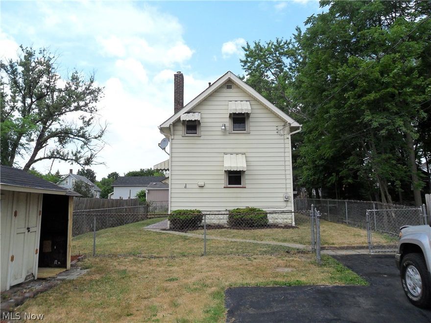 Home faces Smithsonian St. There are many updates. Motivated seller.