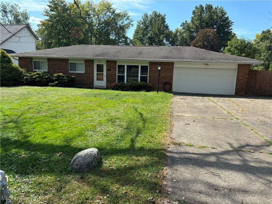 Needs updated. 2 car attached garage. 3 car detached garage. Comp only.