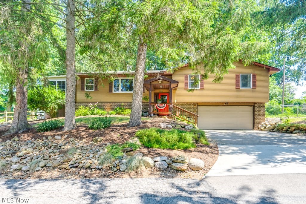 Welcome to the Village of Gloria Glens of Chippewa Lake, where you can enjoy a relaxing lake lifestyle filled with comfort and convenience. This zoned community offers a range of wonderful amenities that are sure to enhance your everyday living experience. This completely updated 3 bedroom/2.5 bath raised ranch on a rare 2-parcel lot is located steps from Chippewa Lake! The home offers unbelievable sunsets visible from the secluded wrap around deck or 3-season room and is perfect for relaxing or entertainment. The gourmet kitchen with gorgeous counters, open layout, fireplace living room, family room with loads of natural light, 3 oversized bedroom, second bath has walk-in shower, 2 car attached garage and loads of storage. In addition, the large, fenced side yard offers plenty of room for young ones or animals to play. Call today to not miss your chance to join the vibrant and sought after community on Chippewa Lake. A public lake with private access through minimal association fees with a private beach, swim and picnic area. Gloria Glens has such amenities as town hall, pavilion, tennis/pickleball/volleyball courts and a playground! Make this your home today!