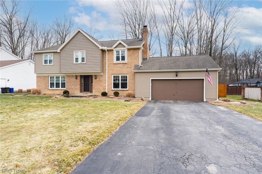 Schedule your private showing today before 5641 Tracy Drive is Going, Going...GONE. On the main level you will enjoy a formal living room and dining room along with a large family room with fireplace and hidden wet bar! Eat-in kitchen has been updated and all appliances stay! From the kitchen step outside to take in the deck, covered patio, and fenced in backyard with storage shed. Upstairs you will find newer flooring throughout and four spacious bedrooms. Owner's bedroom comes complete with walk-in closet and full remodeled bathroom. Basement has been fully finished and includes another full bath and space for a home gym. This home has been pre-inspected and the seller is offering a 1 year home warranty!