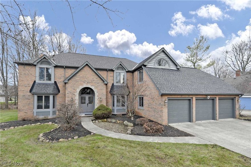 Prepare to be Moved!...into this gracious Westlake Colonial, almost 3500 SQ FT on 1st+2nd floors! Beautiful curb appeal welcomes you to this well-maintained home.  Graceful staircase catches your eye in the grand 2-story foyer.  Formal living & dining rooms in soft, neutral tones and wood floors set the stage for elegant gatherings with crown molding & chair rail.  The open & bright eat-in kitchen features hardwood floors, granite counters, generous cabinet space, recessed lighting & handy desk area.  French doors provide access to the deck & yard.  The family room focal point is the grand fireplace while the glass doors provide tons of natural light.  First-floor bedroom features and en-suite full bath as a 1st floor Master or in-law suite.  Laundry room & half-bath complete this level.  Upstairs find your Master Retreat – complete with vaulted ceiling and fireplace.  The garden tub, separate shower/lav room, dual vanity and skylight.  Spoil yourself with 3 walk-in closets!  A bonus r