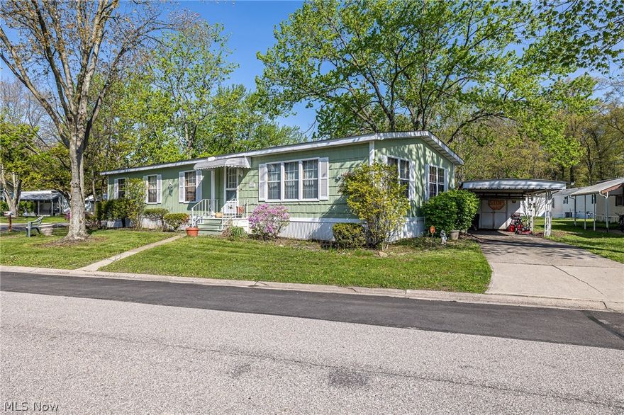 COLUMBIA Park IS A 55 AND OLDER CONCEPT OF LIVING and is Ohio’s Premier Adult Land Lease Community! Amenities Include: Gated entrance! On site Shopping Plaza! On site Management! Walking Path/Dog Walking Path! Shuffleboard! Bocce Ball! Library! Crafts, and Social Hall!  THIS MANUFACTURED HOME features 3 Bedrooms, 2 Full Baths, Living Room, Dining Room, Family Room, Kitchen, Laundry and a Three Season Sun Room, Step Down.  This has a little different floor plan, manufactured in 1976 and is a  Schult Doublewide offering 1344 sqft.  The Kitchen was replaced in 2019, New Flooring, Sink, Counter Top and some Appliances.  The Furnace replaced in 2014 and the A/C in 2023.  This home sets on a corner lot with some green space.  Just bring your own personal decorating ideas and make this HOME SWEET HOME....