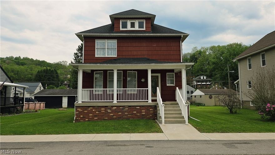 Welcome home to this meticulously maintained 4-bedroom, 2-bath Classic American Foursquare nestled on a flat, level lot in Adena, Ohio! Offering both space and functionality, this home is perfect for comfortable everyday living and entertaining alike.  Step inside to find a spacious living room filled with natural light, along with an eat-in kitchen plus formal dining room, giving you flexible options for gatherings and meals. The convenient first-floor laundry and large full bathroom add to the home's practical layout.  Upstairs you'll find four generously sized bedrooms and a second full bathroom, providing plenty of space for family, guests, or a home office setup.  Enjoy relaxing mornings or evenings on the covered front porch featuring new composite railings, along with updated concrete steps and sidewalk that enhance both curb appeal and durability. Out back, a new deck with a wooden ramp offers easy access and a great space for outdoor enjoyment. 2 car detached garage with wrap-around concrete, provides ample parking and additional patio space. New Central Air in 2025, updated 200 amp service and all major appliances stay. Oil furnace plus wood burning stove with blower for supplemental heating. This move-in ready home combines classic charm with thoughtful updates- don't miss your chance to make it yours! Selling AS-IS with buyers right to inspections.