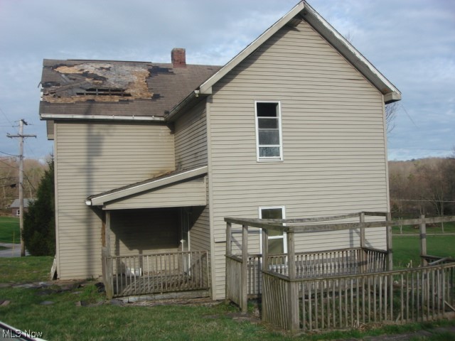 Large lot, edge of small town.
