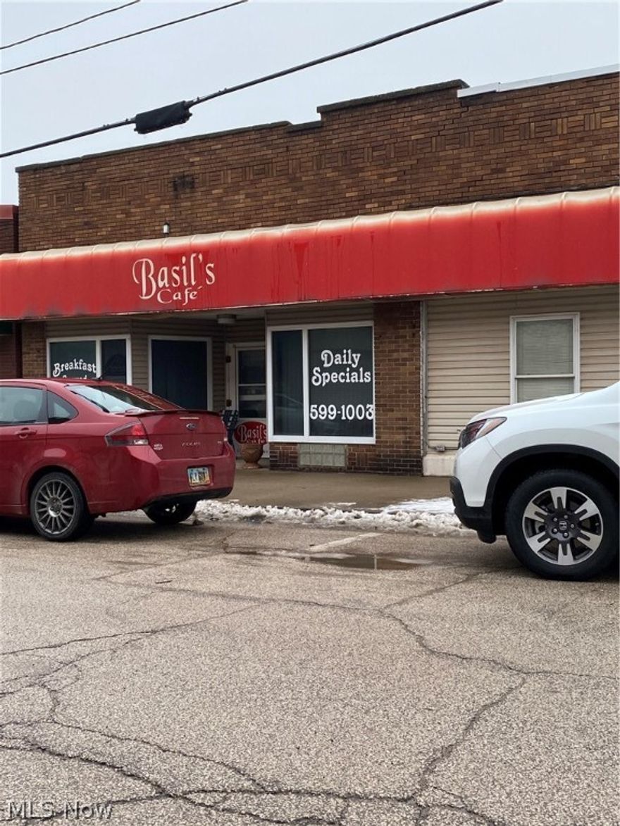 This is located at the top of the hill from Conneaut boat docks and public docks.  There was a restaurant in the downstairs for many years.  There is a 7 ton furnace/air unit on the roof of the building to take care of the restaurant.  There is a furnace room on the first floor that houses the furnace and hot water tank that services the upstairs apartment.  Hot water tank for the restaurant is located in the basement.  This could be made into any kind of business so let your mind dream and grab thus up before someone else does it.