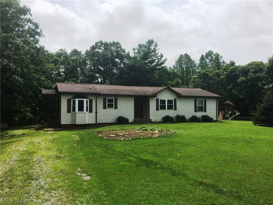 Nice ranch sitting on half acre, spacious covered back deck offering privacy, large laundry/mud that exits to back deck, eat-in kitchen, 2 baths.  Previous owner used propane for hot water tank and range and stated propane hook up is available for heating.  Current owner is selling "as is" and knows nothing about the property.   #979