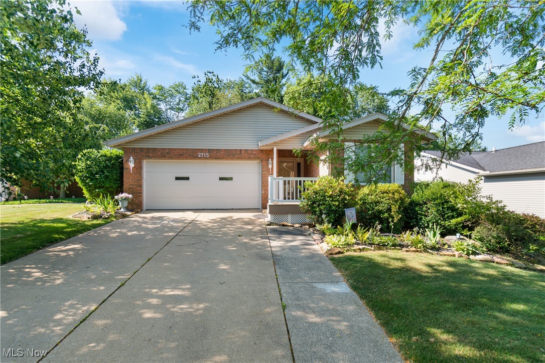 Beautifully updated cluster home offering easy, stylish living! Enjoy fresh vinyl flooring, modern paint tones, and fully remodeled bathrooms. The added mudroom with first-floor laundry is a dream for busy days. The partially finished basement is perfect for a 4th bedroom, guest suite, or bonus space with its own full bathroom. Relax in the glass-enclosed porch, unwind in your private yard, or greet neighbors from the charming front porch. Plus, it's all backed by a home warranty for added peace of mind.