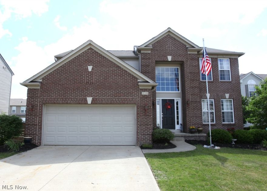 Beautiful home in the desirable Woodgate Farms neighborhood with pool and community center.  This gorgeous brick home has all the updates and large fenced yard.  As you enter the home you will be taken back by the modern style and upgrades.  Open floor plan will make this home perfect for entertaining with pride.  Stainless steel appliances, beautiful hardwood/tile flooring, partially finished basement with bar are just some of the touches you must see.  Large master bedroom has an attached master bathroom that has earned the right to be called a "glamor bath" with subway tiles/stone in shower, tile flooring , granite double bowl sinks and walk in closet.   This is one of Pulte Homes most desirable home styles making it one of the best options on the market today.  Move right into this home today!