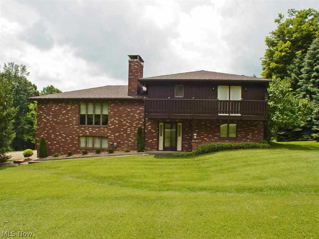 Don't miss out! Wonderful 4 BR brick on 1 acre. Has a FDR, a MBR w/walk-in closet, private bath & balcony. Family room located off kitchen has access to covered porch w/wrap around deck. 2 car integral garage plus1 car det. garage w/2nd story storage. Recent new landscaping. Home warranty included!