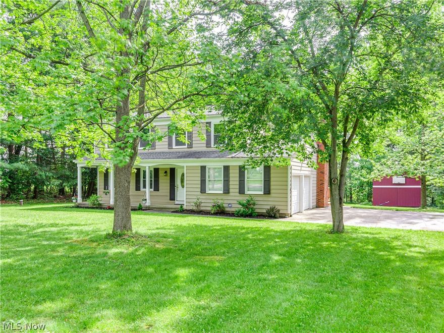 Check out this charming 4 BR/2.5 BA Colonial in the heart of Copley Township!  Walk into the living room with beautiful flooring, a large picture window and half bath and large welcoming foyer.  The completely remodeled kitchen offers granite counter tops, breakfast bar seating, recessed lighting, white cabinets with lots of storage space, double sinks and stainless steel appliances.  Step down into the family room where cozy takes over with a gas fireplace and sliders to the large deck that overlooks the very private backyard, just in time for those family barbecues.  The second floor master suite with en suite bath, ceramic floors and double sinks offer ample space for a sitting area. The lower level completes this home with a large family/media room, a fantastic laundry room area that offers lots of cabinet and counter space. New luxury vinyl plank flooring throughout entire first floor, full hardwood floors throughout second floor. Two car garage. Two story barn with concrete floor