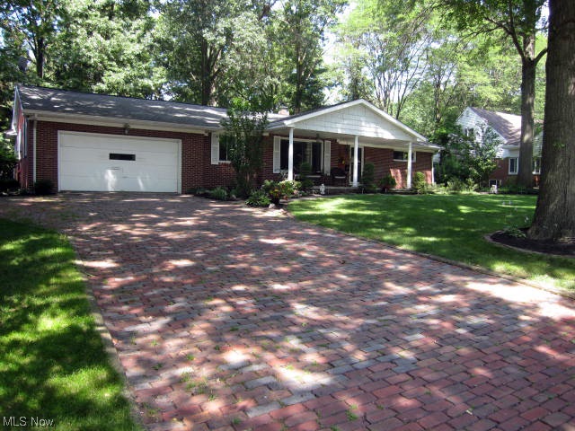 Executive sized Brick Ranch in beautiful neighborhood in Silver Lake Village. The driveway is brick paved. Eye catching huge front porch looks out to professionally landscaped & manicured front yard. The back yard is large and there's a patio off the master bedroom plus a good sized storage shed. Inside is a massive living room with gorgeous hardwood floors and fireplace with full wall built in cabinets and wired for above mantle TV. Kitchen has been updated Craft maid Cabinets, double oven and has just been freshly painted in fashion neutral colors. The entire first floor has recently been painted in decorator colors. Master bedroom addition features walk-in closet, dressing/sitting room, on-suite bath, vaulted ceiling and double door slider to patio. Both bathrooms have been totally updated and main bath has double sinks. Basement has a huge family/recreation room plus a finished office. There is an auxiliary well for watering lawn and washing cars. All kitchen appliances