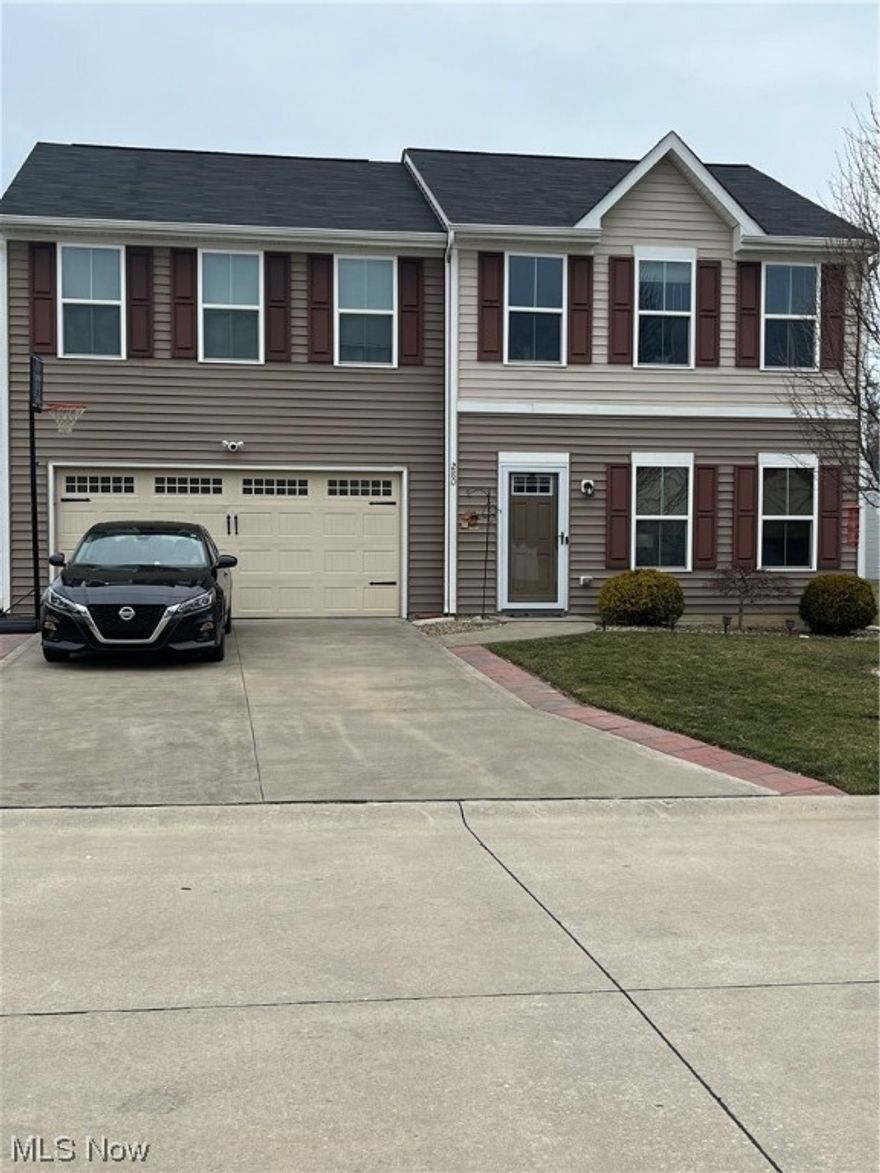 This beautiful 2016 Colonial is located in a cozy community with cul-de-sac streets.  It features a modern open floor plan with abundant space.  The kitchen features a center island with seating with the appliances staying and a separate dinning area which makes it ideal for cooking and entertaining!  You'll love the two pantries for lots of storage. There's a fiex room currently used as a home office as well.  Window trim, window sills, luxury wood vinyl flooring and solid doors replacing bi-fold doors are some of the upscale touches that have been added.  Off the sliding doors is a stamped concrete patio with a terrific gazebo, a newer shed, and firepit to enjoy outdoor relaxation!  Upstairs are four spacious bedrooms.  The oversized owners suite has a walk in closet, ceiling fan and private bath with double sinks.  Two of the other three spacious rooms have walk in closets and ceiling fans as well.  A fantastic feature is the laundry room being upstairs as well as a insulated walk up attic. The pride of ownership is evident with the many extras put into this home: ceiling lights and fans in bedrooms, nice wood stairs and brick outlining the driveway to name a few.  There is so much near by: easy access to freeway, YMCA next door, restaurants, shopping, parks, medical, library and moments away from beautiful Lake Erie!