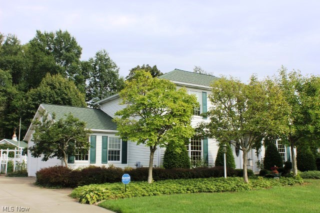 Outstanding inside & out! Located on cul de sac in Mayfair Estates this 4 bedroom, 3 bath colonial offers 3354SF including lower level rec room, lovely open floor plan, 1st floor bedroom & full bath* New carpet & paint throughout, 3 car side load garage & in ground pool with vinyl white picket fence* Vaulted great room with woodburning fireplace with gas starter & French doors to 4 season sunroom* Vaulted sunroom, wrapped with windows, slider to fenced deck & ceramic floor* Formal dining room with crown & wainscoting & floor to ceiling windows* Breakfast room with ceramic floor & French doors to 4 season room* Spacious new stainless steel applianced kitchen with island, roll out shelves & ceramic floor* 1st floor laundry with ceramic floor, closet, cupboards & including washer & dryer* 2nd floor master with walkin, widows walk with atrium door to balcony, built in ironing board, glamour bath with his & her vanity, skylight, shower, corner jetted tub, ceramic floor & stain glass window* 2 additional bedrooms on 2nd floor with walkin closets & guest bath with ceramic floor & skylight* Poured basement walls & glass block windows* Other features are Anderson windows, whole house fan, A/C (not original), shingles (2009), H2O (2014), security system, humidifier, space guard air filter, split water meter (1 for pool & lawn), resurfaced pool (no liner), 12x15 storage bldg. w/cooper cupola* Home warranty provided*
