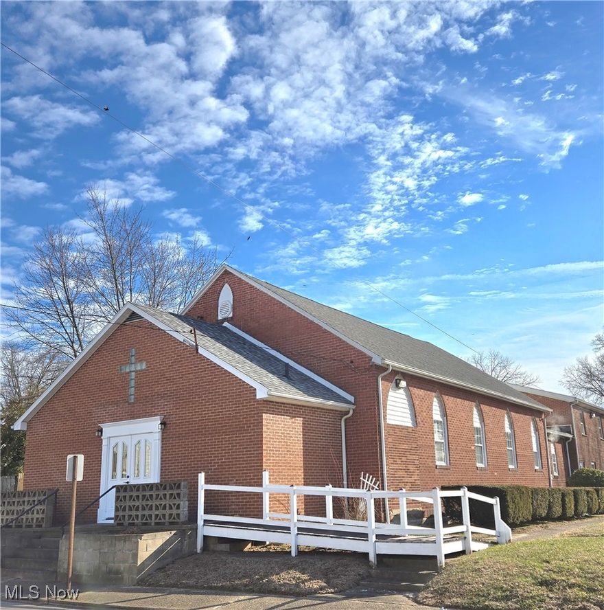 If your looking for a house of worship, this brick building has been very well maintained, updated throughout the years with two new additions being added and the roof is approximately 2 years old. If you are looking for a home base for your new congregation look at this nice space. Large sanctuary with oak pews, nice carpet, sound system and pulpit area plus a nice welcoming entry. There are multiple bathrooms, a large room with a functioning kitchenette providing an abundance of large tables, for dinners, or meetings, plus two 2 large eating areas. There are several areas for classrooms, offices, also a nursery room, This building is located on three nice level corner lots totaling .41 acres in North Parkersburg.  ""Zoned Residential"", this property has numerous possibilities and could be redesigned for apartments. Nice level corner lot gives additional possibilities for the new owner to modify if they wish. Very convenient location.