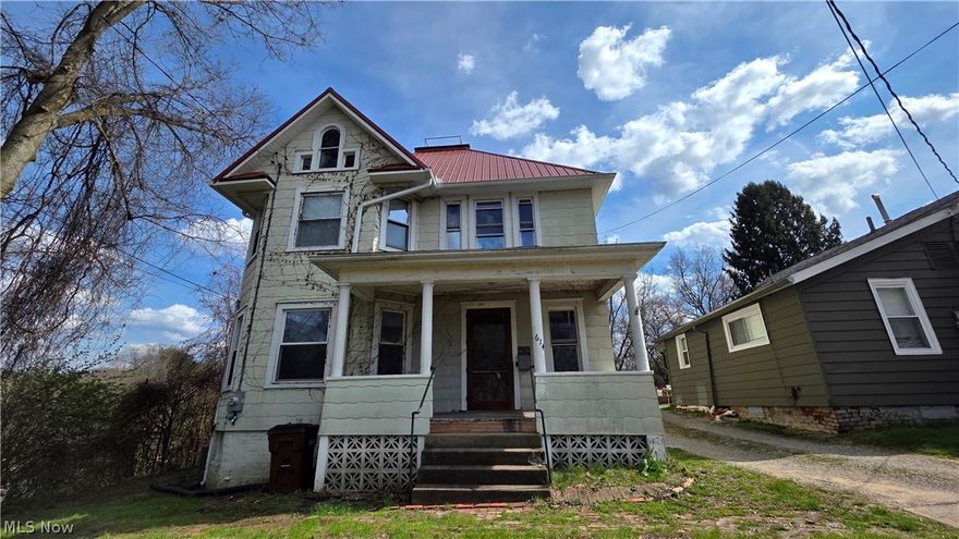 This classic 6 bedroom, 2 bathroom Victorian home is filled with character and endless potential. Offering approximately 2,970 finished square feet, this home provides an incredible amount of space and opportunity. From the beautiful hardwood floors ready for restoration to the stunning original woodwork, built-ins, decorative fireplaces, and intricate plaster detail throughout several first-floor rooms, this property offers the kind of charm that is hard to find. An inviting front porch welcomes you, while a spacious sunroom lined with windows adds even more natural light and appeal. The home also features a large deck offering privacy and a sense of seclusion, perfect for relaxing or entertaining. A large unfinished basement and unfinished attic provide unique character and abundant storage space, with additional potential for future use. A furnace was added in the attic to provide heat to the second floor, and a new metal roof was installed in 2023/2024. Both bathrooms are in need of full renovation, giving the next owner a great opportunity to add value and make it their own.

Conveniently located in downtown Marietta, this property is just minutes from restaurants, shopping, entertainment, and Marietta College. This home would make an excellent investment opportunity, rental, or sweat equity project. The property is being sold as-is. The seller is offering multiple properties for sale and would consider a bundle package, presenting an excellent opportunity to expand your investment portfolio.