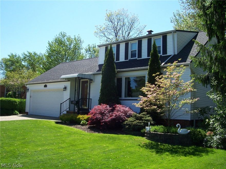 Large home close to shopping, entertainment, and freeway access! Home offers two bedrooms on the first floor, plus two large bedrooms up! The family room on the first could be used as a first floor master with its own full bath and closet space. Sellers were using as a family room; however, it could be used as a teen suite or in-law suite!  The kitchen has been updated wth an eating counter plus there is a dining area with wood floors off the living room! 4-5 bedrooms, 3 full baths, finished recreation room in basement offer a variety of rooms for your family! The back yard has a great deck and landscaping, truly a joy to relax and have family dinners or parties. This home has been lovingly taken care of and has a newer roof, siding, windows, garage door, gutters and downspouts, kitchen cabinets and counters, hot water tank, hardwood floor, deck and landscaping! There is hardwood flooring under all carpets except kitchen. A little painting, some carpet changes and this home is a keeper