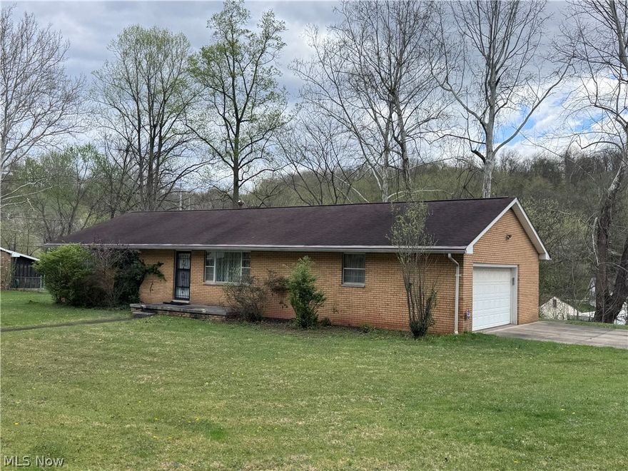 Welcome home to this solid beautifully maintained all brick ranch.  This inviting three-bedroom, one-and-a-half bath home features oak flooring throughout , adding warmth and timeless appeal to every room.  Enjoy easy single-level living with a functional layout designed for both relaxation  and everyday convenience.  The full unfinished basement has endless possibilities.  t side to discover a generous, flat lot spanning over a half acre plus or minus.  Call for your private showing today