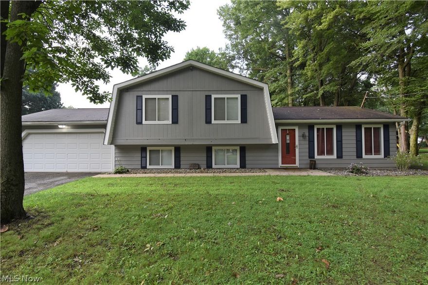 Hurry and schedule your showing for this charming home situated in the Logan Wood Estates! If you are looking for a low traffic area that is still near major shopping outlets, this is the prime home. Offering a spacious living area with stylish laminate floors, a large kitchen with stunning tile on the floors and gorgeous backsplash, this home is a steal. Appliances in the kitchen are staying, so it makes the transition into your new home just that much easier. Lower recreation area is perfect for entertaining, with attached bathroom, it's ideal to send the children. Upper level is set up with three large bedroom and a master bedroom with attached full bath.