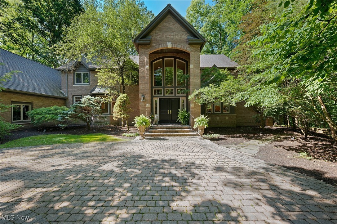 Welcome to one of the most spectacular homes in The Reserve of Medina. This extraordinary home was renovated with the finest timeless architectural details. This home offers a lifestyle combined with luxurious amenities and stunning views of the 2+ acre wooded lot. The renovated French Country designed kitchen offers striking décor and is truly a culinary dream. The Great Room includes a wall of windows, two story ceiling with beams, stunning marble fireplace and wide plank flooring. The first floor Owner's Suite is a gorgeous retreat. 2 Walk in closets, stunning Master Bath plus a private sitting area to enjoy coffee. Just off the Owner's Suite you will find a peaceful room with walls of windows - you will feel like you are in a luxurious treehouse! Upstairs take the main staircase or the private back staircase - 3 large bedrooms plus 2 full baths perfect for your family or guests. A showstopper home, you may recognize it from features in local magazines. From the moment you enter this gracious home you will know this home is special. A true opportunity for a buyer. Come fall in love with 3382 Hardwood Hollow Drive in Medina!