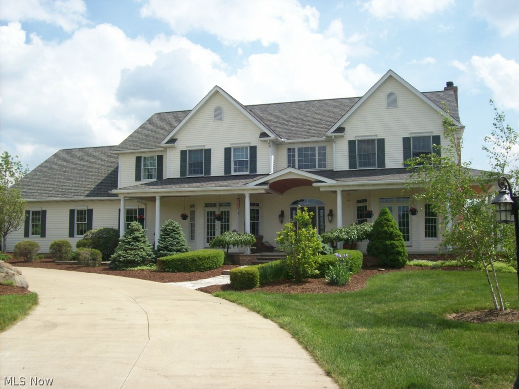 Beautiful 2 story custom built colonial on 10 acres wooded lot. Large, inviting front porch. 4 bedrooms, 4 1/2 baths. Master suite includes fireplace, deluxe bathroom and separate room for closet area. Gourmet kitchen with morning room. 3 fireplaces. Formal living and dining rooms. Sun room, walk in pantry, huge laundry room. Inground pool with surrounding patio, custom built barn with 4 stalls. Full, finished basement walk out to pool area. Additional rooms in lower level for office, exercise, workshop or storage. Bar area in lower level. Lifetime warranty on roof. All appliances stay including washer and dryer. Conveniently located to highways 71 and 271. Enjoy the amenities of charming Medina with access to both Akron and Cleveland. Come see all this home has to offer!!