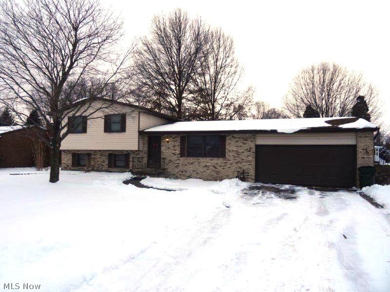 Stop your search, this is just the home you have been looking for! Beautifully maintained split-level close to the heart of town has it all, and at a great price! Open floor plan features a spacious living and dining room, with sliding door to the huge 16 x 16 deck and back yard. Upstairs you will find 3 nice sized bedrooms with huge closets! You will not have a lack of storage in this house, that's for sure! The lower level boasts a huge rec room complete with fireplace, and a separate play room (or could even be a 4th bedroom!). Basement offers tons of storage and a laundry area, new sump pump. Nothing to do here but move in!