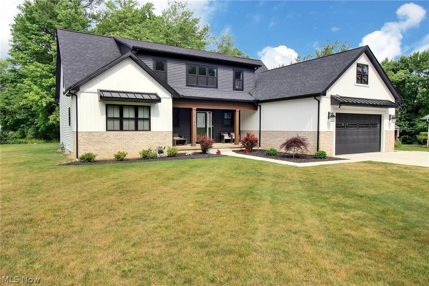 This beautifully designed, move-in-ready home is nearly new and built with top-tier energy-efficient materials. Smart-wired with Lutron electrical systems, the open floor plan features a white chef’s kitchen with a dual fuel ZLINE gas range. The first floor boasts a primary suite with a luxurious bathroom and a spacious walk-in closet. Upstairs, you’ll find three bedrooms, a large loft, and two bathrooms. The lower level includes a rec room, a home fitness room, and a full bathroom. Located on a quiet street, this home is conveniently near Eton Chagrin Boulevard, offering fine dining, shopping, Beechmont Country Club, Chagrin Valley Country Club, and South Chagrin Reservation, with quick access to I-271. It is situated within the highly regarded Orange School District, known for its commitment to academic excellence. Additionally, the home is wired for electric vehicle (EV) charging. Don’t miss the opportunity to experience modern living in a prime location.