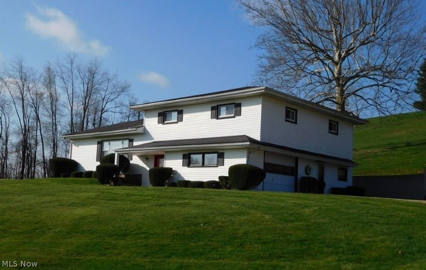 Location! Beautifully maintained. Total 2,931 sq feet of living space. Two family rooms, one with fireplace. Fabulous dining room with stone fireplace, hardwood floors, french doors to huge private covered patio. White galley kitchen, also has 12 x 8 breakfast room. Could be converted to a walk in pantry, home office, toy room and more. Formal living room has like new beige carpet. Large foyer entrance. Over sized bedrooms each with a walk in closet. Lower level family room has a bar for entertaining family & friends. Spacious home with plenty of elbow room. Must see inside. Priced to sell!