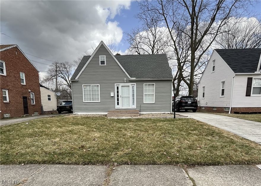 COMPLETELY REMODELED!! THIS HOME IS A MUST SEE!   This beauty has many updates, including a new roof, new vinyl siding, new windows, 3 full bathrooms with a stylish bathroom in the basement that you absolutely want to see!!   The kitchen has been updated with granite countertops and a modern faucet that will last for years to come. 1 car garage. Dining room with barn doors, new fixtures throughout- new HWT, and new paved concrete driveway. The 2nd floor offers a Master bedroom with a full bath.  The other bedrooms are accommodating for the rest of the family. This home is freshly painted from top to bottom, new flooring throughout. The lower level has a nice partially finished REC room, updated Electric, and glass block windows.  In the summer, enjoy a nice size backyard with deck. There is absolutely nothing to do -just move in! Won't last -show & sell.  This updated 3 bedroom Cape Cod is located in a highly sought after Cleveland neighborhood (Lee/Harvard).  Close to shopping, restau