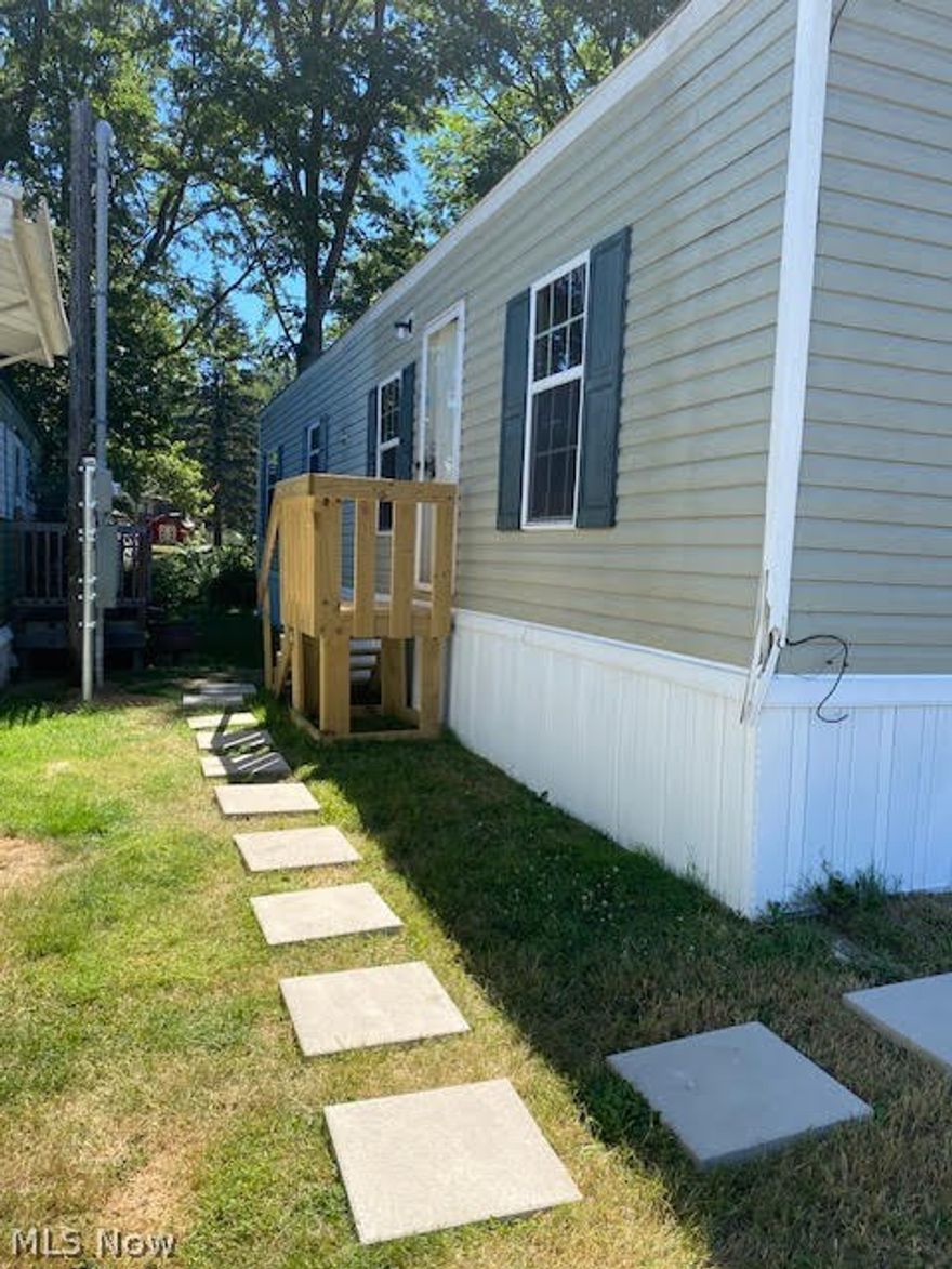 2011 Giles mobile home located in Highland Mobile Home Community in Akron. The home is 16x48 and has 3 bed/1 bath. Water and sewer are metered. Trash is included in lot rent.