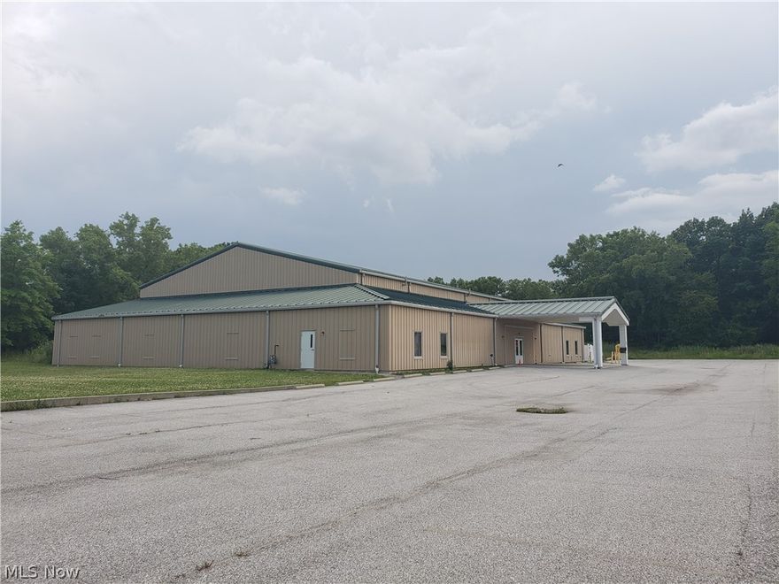 Tremendous opportunity to own this newer 13,231 sq ft building on 7.92 scenic acres in Brooklyn! Built in 2007, the building features geothermal heat and new air ventilation system, 2 offices, 3 restrooms, large front windows, covered front entrance/car port and an open layout with high ceilings. The parking lot has spots for 50+ car with plenty of room to expand. The many acres of wide open land surrounding the building and features a creek along and vibrant wildlife that make it prime for development with a view! Currently used as a sports school, the building was originally built to be a church and daycare (interior plans and plumbing for multiple classrooms/offices are available). The opportunity for continued use as a sports school or redevelopment as a church, daycare, educational facility, recreational facility, healthcare center, residential single or multi-family development. VIDEO TOUR AVAILABLE!