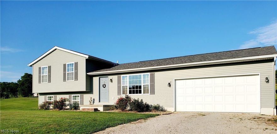 Check out this well maintained Quad-Level home on 5 acres in East Muskingum School District. This home offers 2 living rooms an open concept kitchen/dining room, a huge laundry room, 2 car garage, 2 bathrooms and 3 bedrooms including a master suite. The floor plan offers plenty of room for everyone including basement storage space. Located just outside of the village the location offers a beautiful country setting but close to town. Come take a look today!