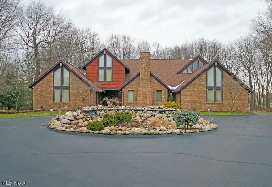 Over 12 impeccable wooded acres in a prestigious and desirable location in the middle of Jackson Township. For those who enjoy their privacy but close to shopping, country clubs, interstate and fine dining, this home would be ideal! This 7,000 sq ft, well built home is in need of modernizing and would be enjoyed by those who have the creativity to make it their own. Priced in "as is" condition and priced to sell.