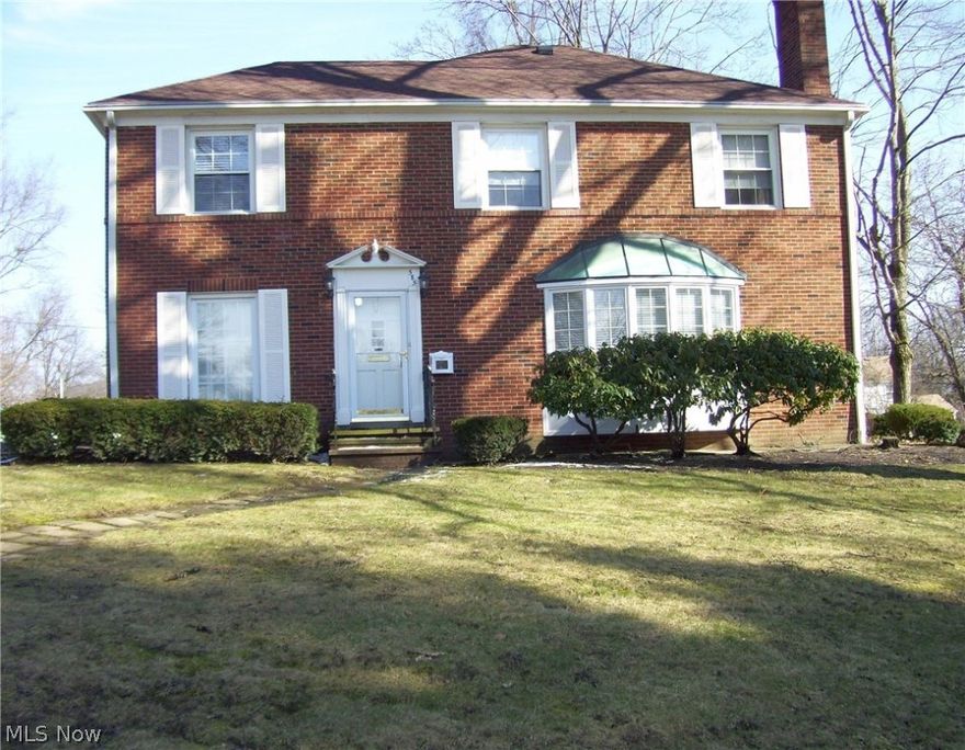 Welcome to this all brick distinctive Georgian colonial! Here you will find hardwood floors, updated bathrooms and kitchen, and many different living spaces. There is a large living room with bayed window and fireplace, formal dinning room, office 3-season sun room with skylights and a fireplace and family room on the first floor.  Upstairs are 3 generous sized bedrooms and two full baths;there is abundant storage in the master bedroom closets. On the lower level is a rec room with a  wood burning fireplace and a bar. Updates include: furnace, central air, roof, hot water tank, appliances, (microwave is 2 months old and refrigerator is 6 months old). This home has been meticulously maintained and shows pride of ownership  throughout. It is located across from Good Park Golf Course which gives it additional privacy. Charm and character abound; a true gem!