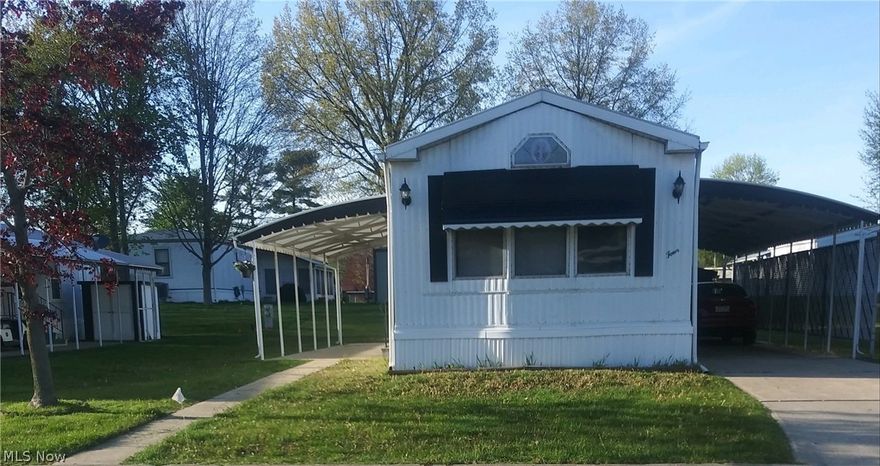 COLUMBIA PARK IS A 55 AND OLDER CONCEPT OF LIVING and is Ohio's Premiere Adult Land Lease Community! Amenities include: Gatehouse managed entrance! On site Shopping Plaza! On site Management! Walking Path/Dog Walking Path! Shuffleboard! Bocce Ball! Library! Crafts, and Social Hall!  This 1989 Schult single wide manufactured home is very nicely maintained.  Actually it is as cute as a button !!!!!  This home features 980 sqft. with 2 bedrooms, 1 bath accessible from the master bedroom and also the hallway.  The living room and eat in kitchen allow for a very open floor plan.  All appliances stay.  The roof was coated in 2018 along with the replacement of the A/C Unit.