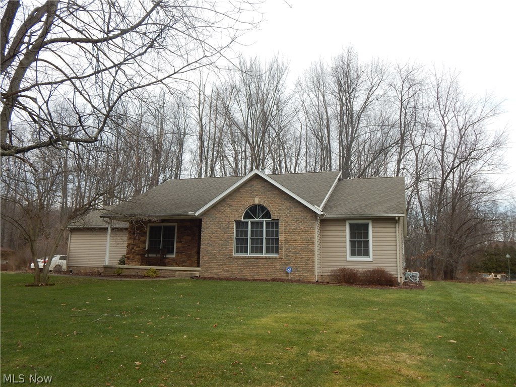 Irresistible comfortable ranch style home featuring Beautiful vaulted Great room with gas fireplace. Enjoy the tasteful chef's special kitchen, Vaulted ceiling, fully appliance, island breakfast bar. Formal dining room that could be used for the casual owner as first floor Den/Office. Many upscale features, walk in closet in master bedroom, Vaulted ceiling with bright open window featured in second bedroom. First floor laundry and enjoy your summer days on the approx. 25x25 freshly stained deck. Patio, oversized attached two car garage. You have to view the open stairway to lower level. Offering second mini entertainment kitchen large size family room with gas fireplace, elaborate Billiards area for all the challenges of family games and play. Oversized full bath in lower level, along with storage room/utilities. This is a very well cared for home sitting on over 1 1/4 acres over looking wooded area. Call this home today.