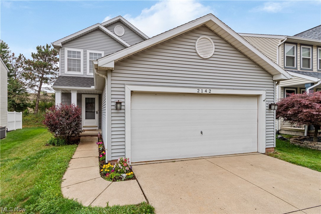 Welcome to this 3 bedroom Colonial with 1st floor laundry in the Village at Coventry Crossing. Inside you will find the large open concept living area with laminate flooring. In the Dining area there is a Patio door to your fenced in backyard. Let's go Upstairs to the 3 bedroom, the master with access to the bathroom with double sinks. Basement is partially finished. You'll enjoy the attached 2 car garage which goes directly to the kitchen. Roof, gutter and HWT in 2013. Coventry Crossing has community playground and splash pad. Close to Highway, shopping, Firestone Country Club and Firestone Metro Park. Schedule your showing today before it's gone.