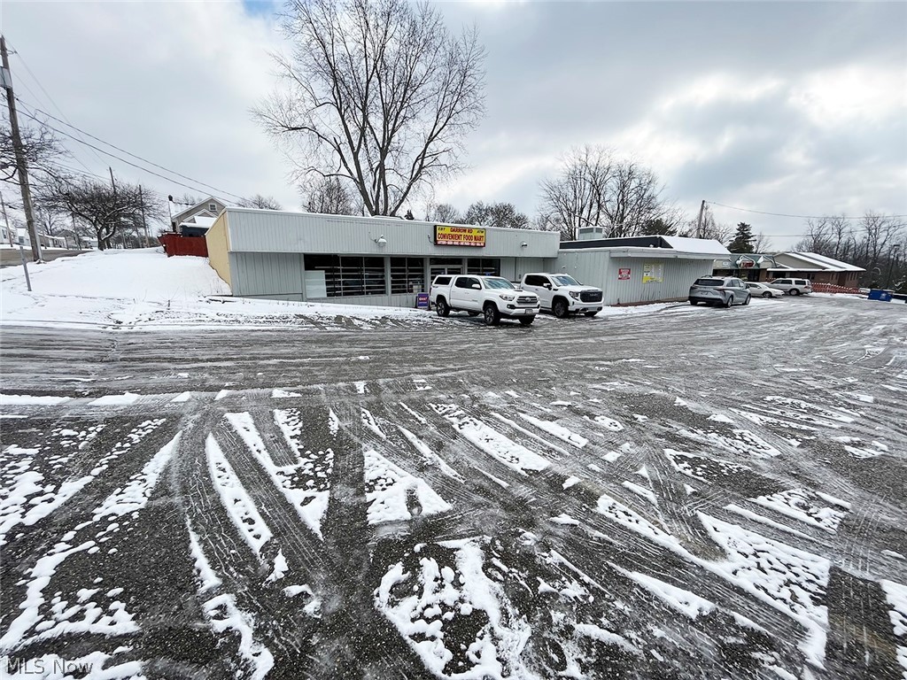 Former Convenient Store with Over 5,000 SF. Block Building. Paved Parking & Double Road Frontage. Akron, Ohio - Summit County. Online Bidding Available. ABSOLUTE AUCTION, all sells to the highest bidder on location. ONLINE BIDDING BEGINS TUESDAY - FEBRUARY 14, 2023 - 12:00 PM, and AUCTION LIVE ON-SITE BIDDING WILL BEGIN THURSDAY - FEBRUARY 16, 2023 - 1:30 PM. Real estate features a former brick-and-block convenience store with over 5,000 square feet of space. Additional features include man doors, an overhead garage door for deliveries, multiple restrooms, extra storage, a kitchen area with a walk-in cooler, paved parking, and public utilities. The property is close to highways, schools, and neighborhoods. NOTE: Also selling ONLINE ONLY: Portable Hood systems - Pop Cooler, All Sizes - Coin Laundry Machines - Display Shelves - Hobart Slicer - Large Quantity Of Misc. Items. TERMS ON REAL ESTATE: 10% down auction day, balance due at closing. A 10% buyer’s premium will be added to the high