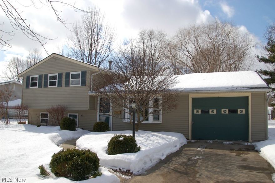 This home is just waiting for you to make it your new home. Very well maintained split with partially fenced in yard plus a partial privacy fence that surrounds the patio and deck.  Lovely living room with large bowed window that brings the outside in. A bright and cheery eat in kitchen comes with all appliances. The spacious family room features a brick wood burning fireplace and built in cabinets. Perfect for entertaining. Make your appointment today to see this great home. Easy to show.