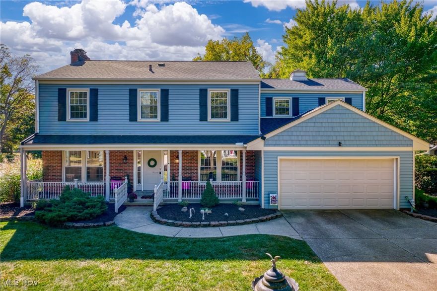 Ideal location near the center of historic downtown Hudson with a park in the back yard! This home is truly perfect to move right in an enjoy. Step in from the covered front porch to find the fireplaced living and dining rooms to either side, offering an open floor plan  for spacious entertaining and hardwood floors throughout. There is a well appointed kitchen with counter seating and a family room with attached sunroom. Upstairs you'll find, an oversized primary bedroom with walk-in closet and private bath. Three additional sunny bedrooms shared updated hall bath. The fenced in backyard offers lots of privacy and a new patio and steps away Cascade park with playground, ball fields and walking trails. You don't want to miss this opportunity, an exceptional value and village location.
