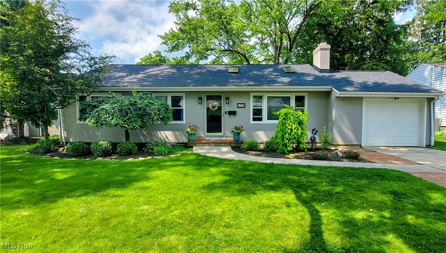 Welcome to this lovely, very well maintained 4 bedroom 2 full bath ranch situated on a quiet street in the Stan Hywet Hall neighborhood. The most visited,Cuyahoga Valley National Park is at your doorsteps just a few miles away. The home comes with an array of improvements in the last 4 years. Starting in 2019 the basement was waterproofed both exterior and interior including proper drainage. This improvement comes with a transferable lifetime warranty from Ohio State waterproofing. in the spring of 2020 a complete roof tear off and shingel replacement,vinyl siding, whole house painting including windows,gutters and deck. The chimney was completely re mortared and painted which looks brand new. In 2021, the main floor bathroom was completely gutted and updated to include a new exra large soaking tub, all new tub surround wall and floor tile,vanity and overhead fan. Spring of 2025 the interior has been  freshly painted throughout. The basement has been updated with a new shower unit and vanity. Please note the 4th bedroom is located on his level with proper egress to meet all building codes to be considered a 4th. bedroom. Basement has all new carpet and Life Proof vinyl flooring throughout bedroom and main area. The laundry and furnace room also has a utility sink and sump pump. This very well manicured and landscaped yard allows you to enjoy all this in your private fenced in back yard while entertaining on the deck or enjoying a nice evening fireside. This home is anxiously awaiting a new home owner that has to do nothing to the property other than move in. Schedule your showing today! It may not be on the market to long.