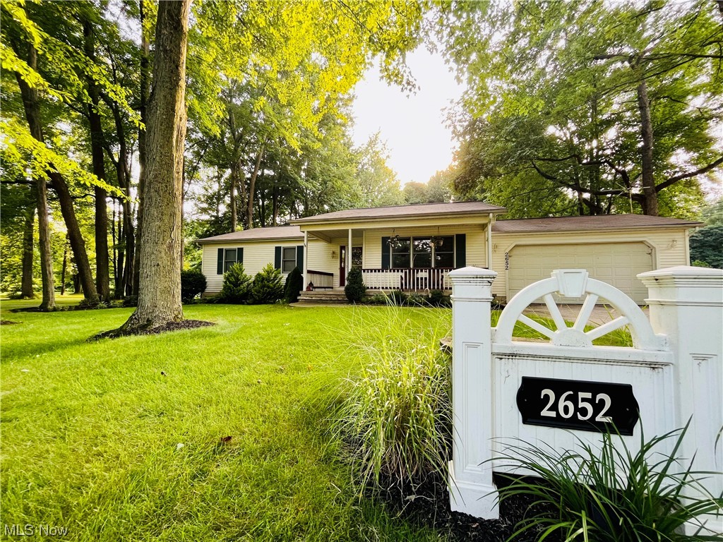 Welcome to this well-maintained, charming and efficient, high-quality ranch! Hard-to-find one floor living with lots of extra space. Enjoyable front porch leads to comfortable foyer, adjacent office or den. With so many positions working from home, this space is an asset. Eat-in kitchen is broad with plentiful dining space and stool seating at the granite counter / bar top. Granite all around, including the additional butler's counter. New dishwasher, in-kitchen pantry, and another pantry in nearby utility room. Purposeful storage and quality workmanship here. Family room boasts magnificent brick and oaken mantle with gas stove, vaulted ceiling, hardwood floors, and large casement windows to backyard. Hardwood trim throughout. Grand owner's suite with walk-in closet and large en-suite with double vanity and jet-tub. The finished part of basement is exceptional; room to lounge, rec area, music or games, AND the bonus room can be your personal crafting space or home theatre. Installed wi