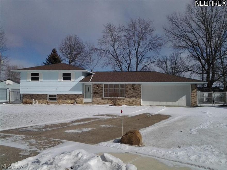 Wonderful Split-Level in a very nice Cul de Sac. NEWER -  Roof 2012, Windows -2013, Kitchen, Carpeting, and Main Bath. The list goes on. Large utility room with new ceramic flooring walks out to the 196 ft. deep lot with fully fenced huge private backyard. Two car garage with new garage door and opener.Call for your personal tour today.