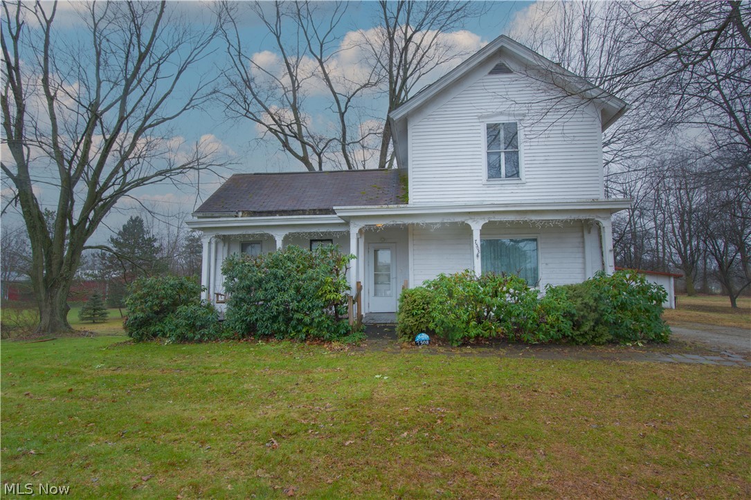 Enjoy quiet country living in this three-bedroom farmhouse on 1.5 acres in Marlboro Township. The first floor offers a living room, family room, a galley-style kitchen (with appliances, plenty of cabinet space, and a breakfast bar), one bedroom, a full bathroom (with a walk-in shower), and a convenient 1st-floor laundry. The second floor has two large bedrooms (one has a half bath with access to a walk-in storage/attic area). This home also offers a handicap ramp off the back door, a full basement with abundant storage, and a detached one-car garage and carport. Situated in Marlington Schools and within walking distance of New Baltimore Ice Cream!! Make an appointment for your private showing today!