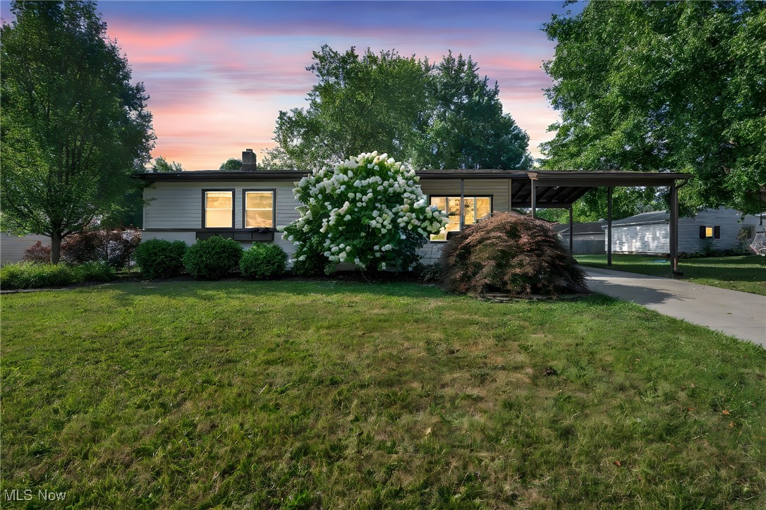 Meticulously maintained and move-in ready, 2314 Lynnwood Drive is the open-ranch you’ve been waiting for—filled with natural light, spacious rooms, and thoughtful updates at every turn. Pride of ownership shines through: new garage roof (2025), new basement flooring (2025), new dishwasher (2025), new hot water tank (2024), disposal and microwave (2022), refreshed first-floor flooring (2021), updated kitchen and bath countertops (2021), plus a finished lower level (2017) that adds flexible living space and a true second full bath—making this rare 2.5-bath home a standout in the area. Outside, a large lot invites play and relaxation with a built-in treehouse, deck, and raised garden behind the garage. Everyday convenience continues with an oversized driveway, a two-car garage offering abundant storage, and an additional covered carport area—perfect for extra vehicles or gear. Set on a quiet street and cared for with exceptional attention, this Stow ranch delivers easy, single-level living with room to grow downstairs. Easy to show—come see the difference pride of ownership makes.