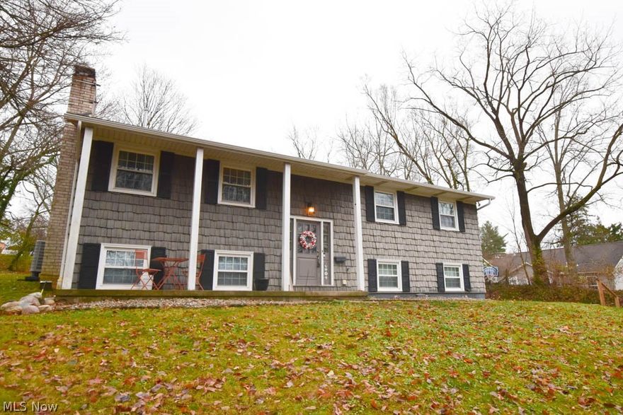 This spacious North Canton bi-level is the perfect family home! Nicely updated with newer carpet in the living room with a gas fireplace and adjacent dining room with chair rail and patio door access to the sunroom. You'll appreciate the easy to maintain laminate flooring in the kitchen complete with all appliances, a ceiling fan and plenty of cabinet storage. Down the hall, you'll find 3 bedrooms and 2 full baths which includes the owner's suite with a double closet and an en suite bath. The lower level adds a wonderful family room with new carpet, a cozy wood burning fireplace, a convenient half bath and access to the 2 car side load garage. Outside amenities include a paved driveway, a large yard with a deck, patio and shed for lawn equipment! Additional improvements in the past 2 years are kitchen appliances, gutters with gutter guards and basement waterproofing. Make your appointment to see this beauty in a prime location near Price Park and the middle school today!