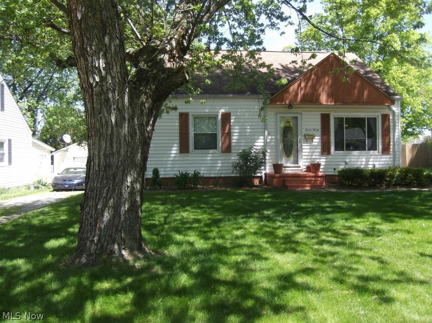 A move-in ready home for a modest price. Updated kitchen & bath. All applianced (2) fridges, stove, washer & dryer. Wonderful private back yard with vinyl fence & large covered patio, garden bed and lovely landscaping. Vinyl clad windows, central air, hardwood under carpeted areas. Basement could be living space and has access to outside. Snow blower & mower are gifts from seller. Very inviting home.