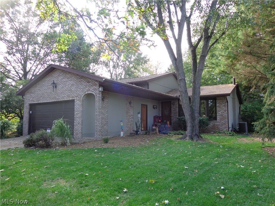 Wonderful 4 level split in Jackson!  Well maintained one owner home has 3 bedrooms and 1 1/2 baths. Wooded 1/2 acre lot feels like a vacation home. Laminate wood floors in kitchen and dining area. French doors lead to fully fenced backyard with a large deck, perfect for entertaining. Cozy family room with wood burning fireplace. Large laundry room/mudroom off of garage. Newer roof, furnace, A/C. Don't miss out! Call today for your private showing.