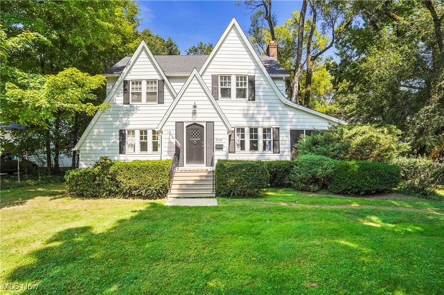This delightful Silver Lake Estates Colonial is filled with beauty and charm throughout. Being situated just off of the Blvd within a short distance to the Silver Lake  boathouse, beach  and picnic area where residents enjoy swimming, boating, and fishing privileges. This home has a foyer entry/vestibule that steps into the spacious formal living room with beautiful hardwood floors (that continue throughout most of the house) There's also a woodburning fireplace and side door entrance to the screen enclosed summer porch. The spacious formal dining room is elegant, the newly remodeled kitchen is filled with natural light and feels quite cheerful with bright custom cabinets, counters, backsplash and stainless appliances. Between the kitchen and dining room is a second eating area, it has a vintage built in cabinet with leaded glass doors.  A first floor 1/2 bath and an entrance to the 2 car attached garage complete the first floor. Take the open staircase to the second floor where the charming features  continue throughout the four bedrooms,  tastefully updated full bath and a nice cedar closet. The basement is large with  a second fireplace, a potential rec room and plenty of extra room for storage. Silver Lake residents also have access to a lovely park adjacent to the Cuyahoga River  that includes a kayak/canoe launch, picnic shelter, hike and bike trail, basketball and tennis courts plus the baseball field. Call today to see this lovely home and community!