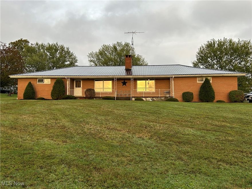 Want to have the convenience of living close to amenities, but have a private setting? Look no further! This well maintained brick ranch home is located right across from the newly built Carrollton Schools.  This home has plenty to offer including three bedrooms and two bathrooms.  Also included on the main floor is a living room and den that have remarkable gas fireplaces.  Enjoy the serene views from the back screened in porch or the front covered porch.  This home also has a full basement including a wood burning fireplace, living space, laundry area, and plenty of storage.  Newer roof, central air system, and many cosmetic upgrades throughout.  Come see all this home has to offer! Don't hesitate, call and schedule your private showing today!
